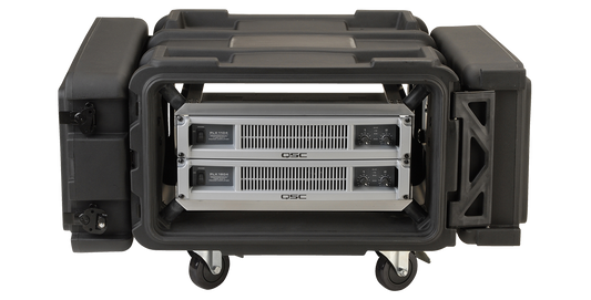 Deep shock rack with 24 inch depth and vibration mitigation, shown with mounted QSC rackmount amplifiers and durable rolling case.