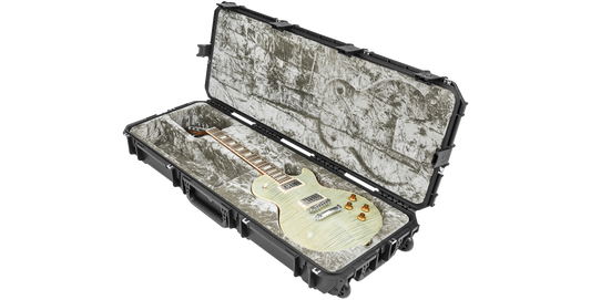 Angled view of SKB iSeries Guitar Case - Les Paul Waterproof featuring a snug fit for a white electric Les Paul guitar.