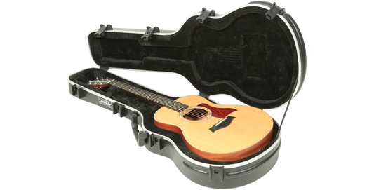 Taylor GS Mini Guitar Case shown open with guitar inside, featuring plush lining and TSA-approved locking latches for secure transport.