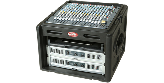 Angled view of 10 x 6 Compact Rack Case featuring steel rails, TSA locks, and mounted audio mixer and amplifiers for DJ setups.