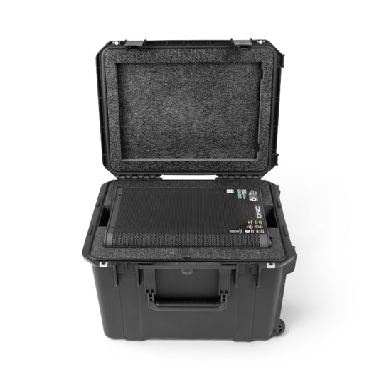 SKB Cases iSeries waterproof hard case with custom foam interior holding a QSC CB10 PA speaker and accessory cutout.
