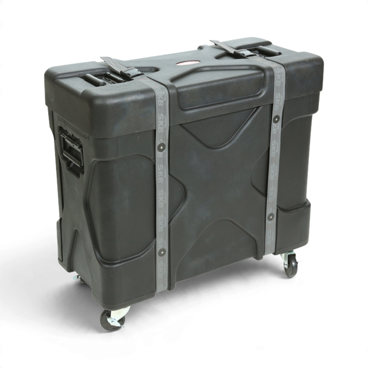 SKB Cases Trap X2 black roto-molded drum case with heavy-duty straps, casters, and X-pattern reinforced design.
