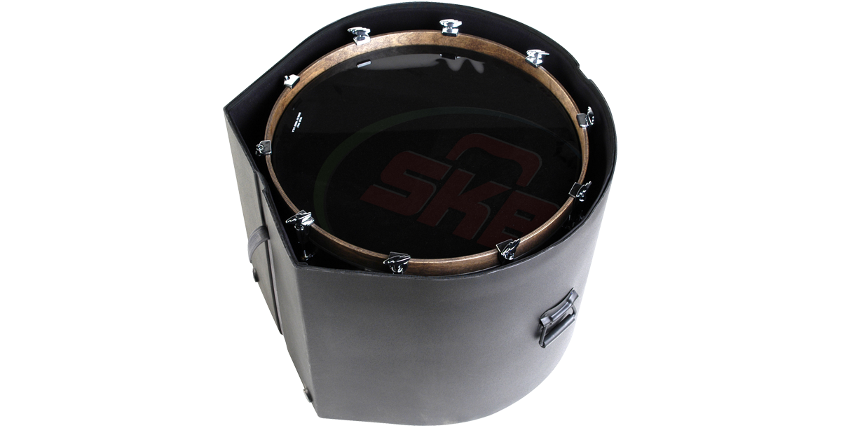 18 x 24 bass drum securely placed inside roto-molded case with padded interior, showcasing snug fit and protective design.