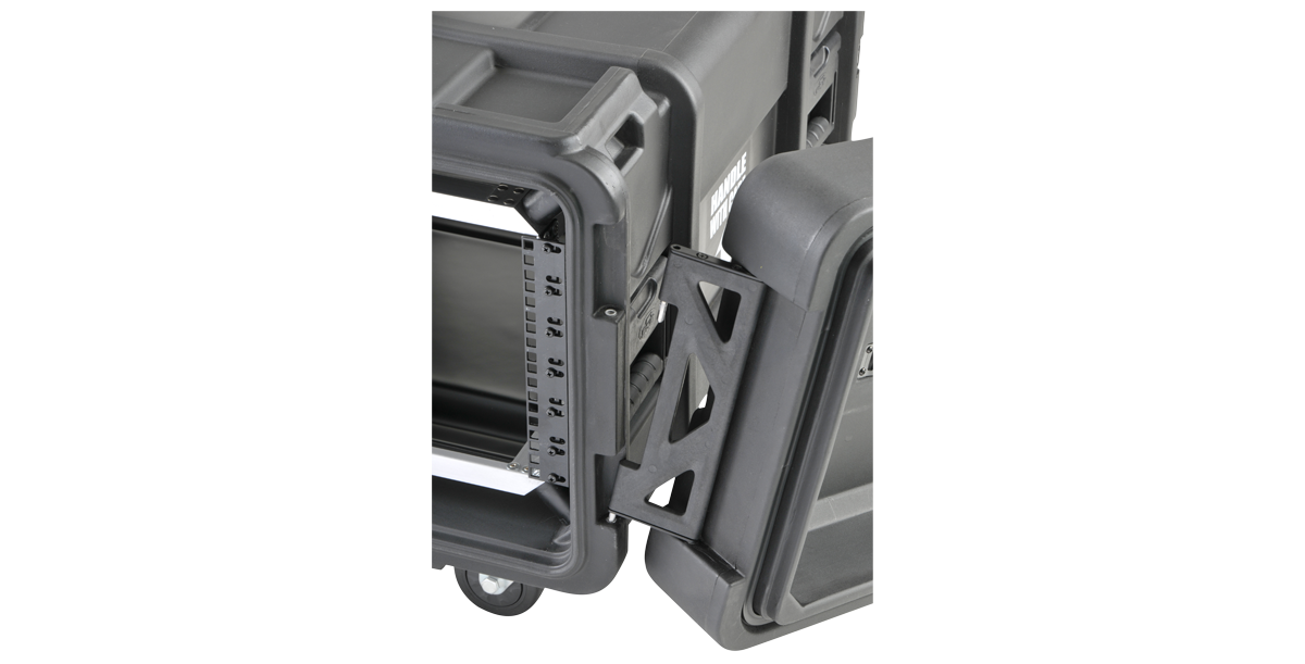 Close-up of adjustable rail system inside 28-inch shock rack, showing precision mounting holes for versatile equipment fit.