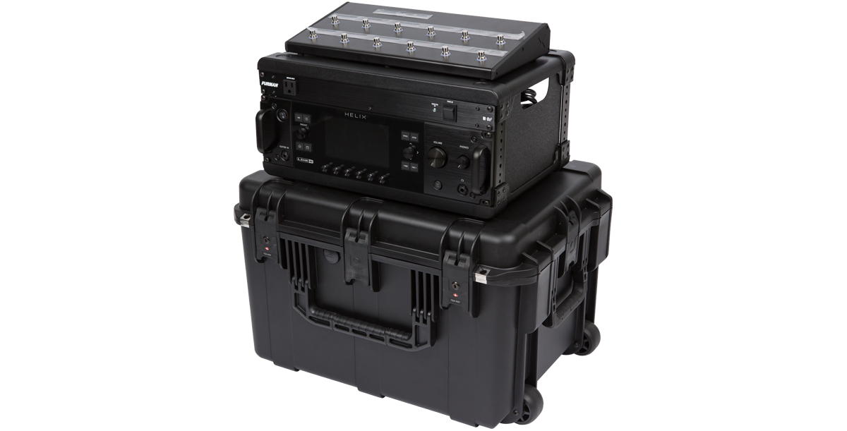 Side angle of 4U iSeries Guitar FX Fly Rack with Line 6 Helix setup on top of durable molded case for secure transport.