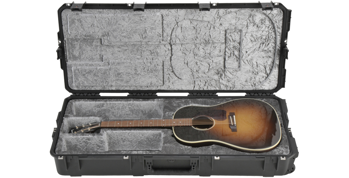 iSeries Guitar Case with acoustic guitar inside, showing waterproof, TSA-lockable design and molded interior for secure neck support.