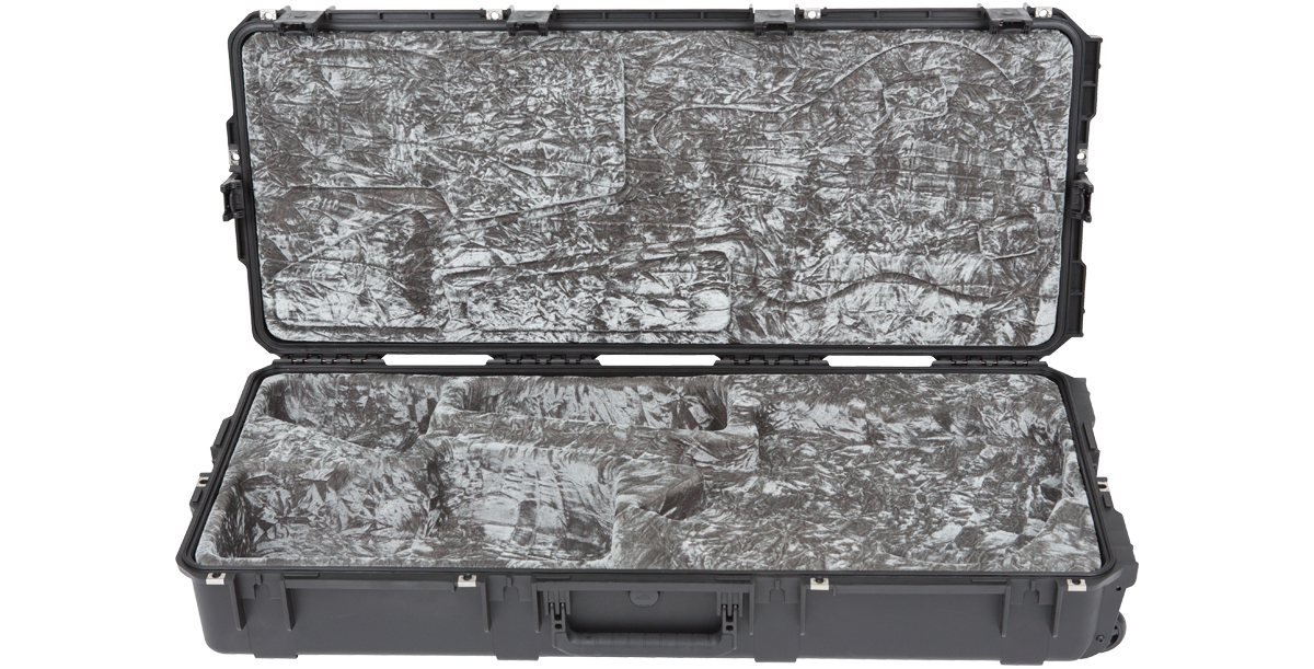 Empty iSeries waterproof guitar case for Jaguar and Jazzmaster, showcasing custom molded interior and rugged exterior for secure transport.