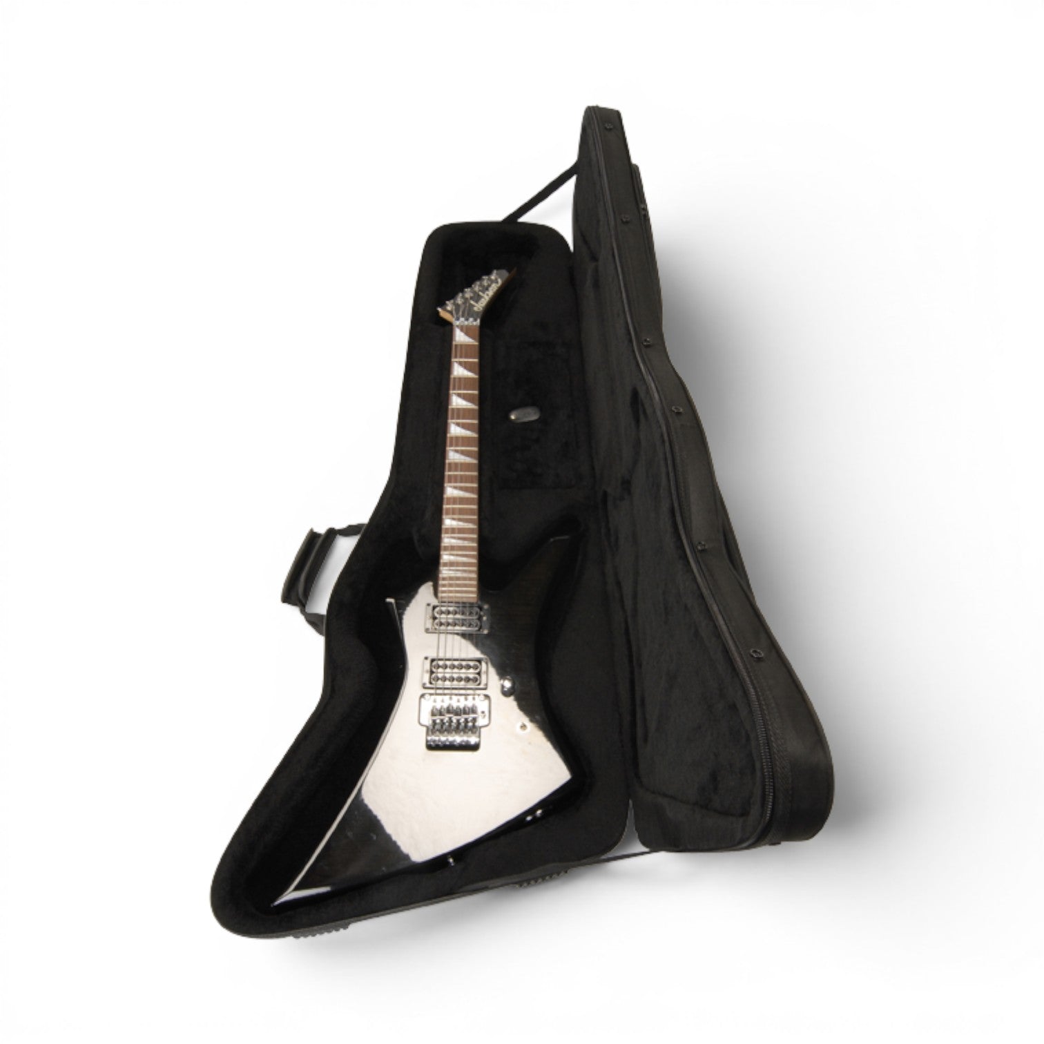 Explorer guitar inside soft case with plush interior and molded foam support for superior protection during transport or storage.