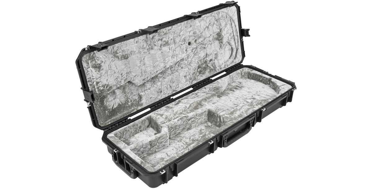 Angled open view of iSeries Waterproof PRS Guitar Case showing molded compartments and plush lining for secure instrument storage.