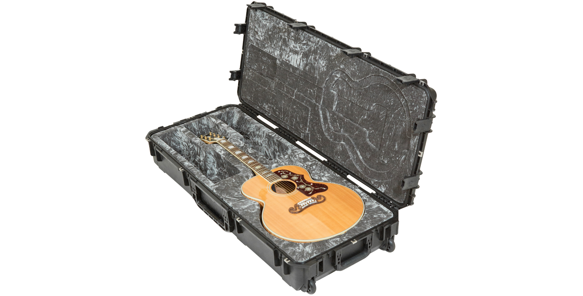 Jumbo Acoustic Guitar Case with reinforced corners and plush lining, designed for watertight protection and TSA-approved travel.