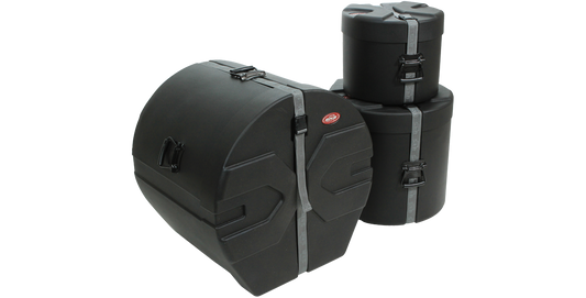 SKB Drum Case Set from the SKB Drum Package, featuring durable molded cylindrical cases with secure straps for tom and bass drum transport.