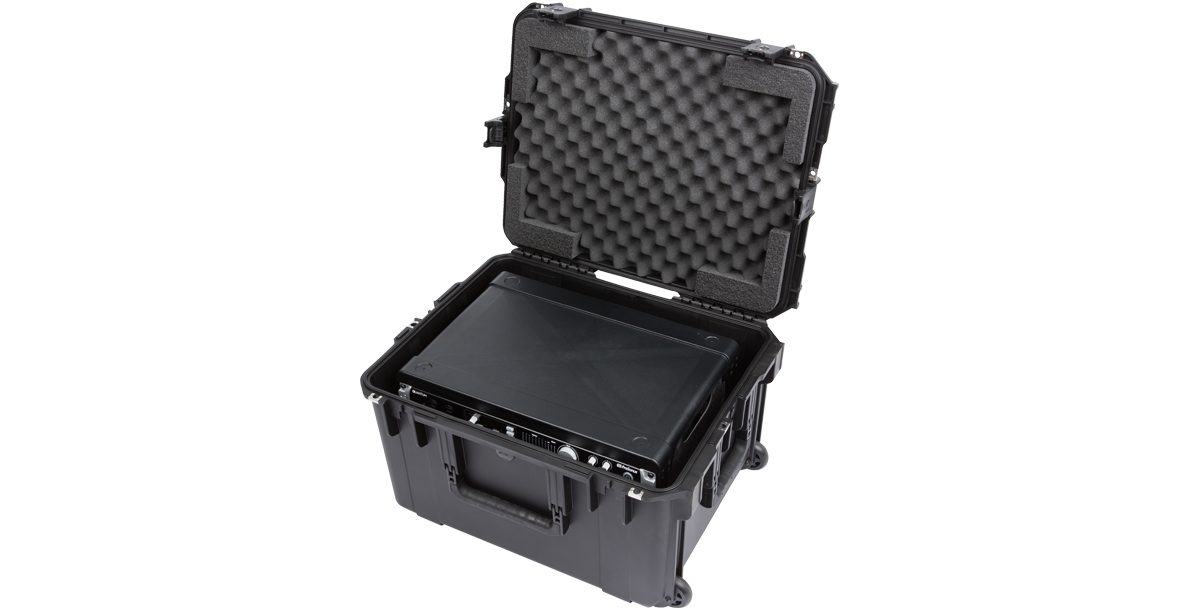 Partially open iSeries Fly Racks case with visible foam padding and shock rack, built for rugged travel and pro audio protection.