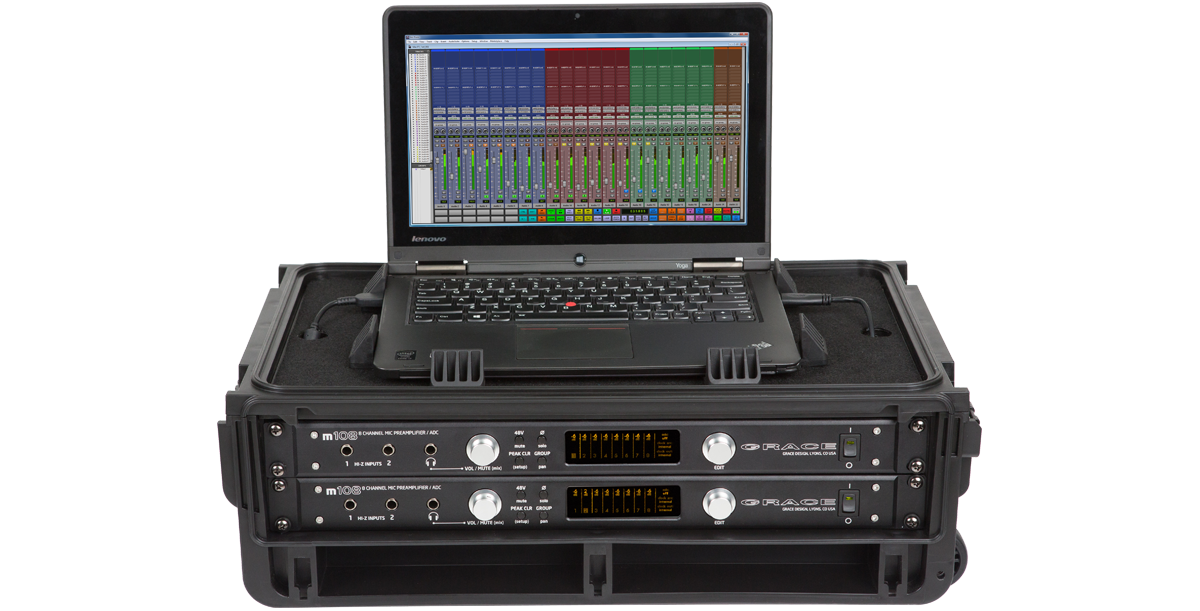 Injection Molded 2U Rack Case with dual rack units and laptop, designed for secure and organized studio gear transport.