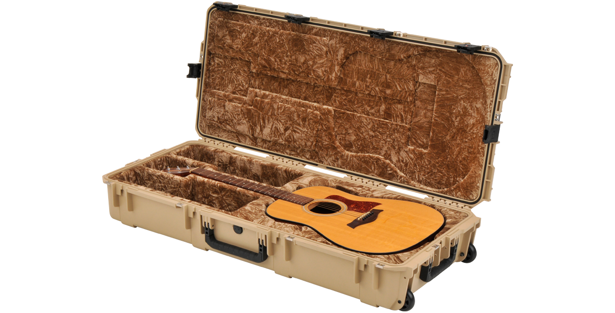 SKB waterproof acoustic guitar case in tan, open with dreadnought guitar, TSA-approved and impact-resistant for travel and storage.