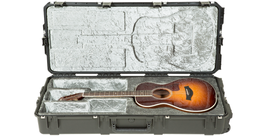 Waterproof Guitar Case - iSeries Case with plush silver interior securely holding an acoustic guitar; features TSA locks and rugged design.