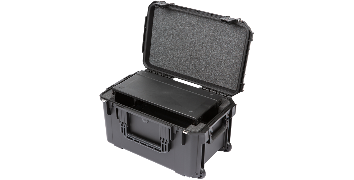 Angled view of Injection Molded Shallow Rack - 4U iSeries Fly Rack showing secure fit for audio equipment with protective foam lining.