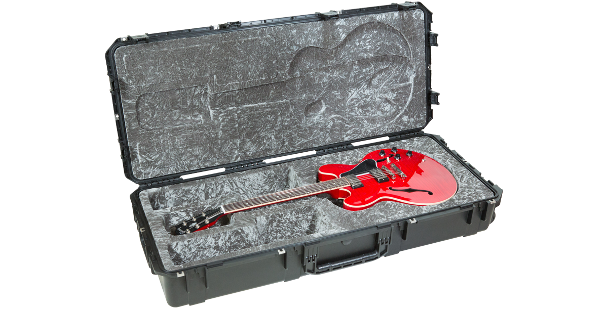Red 335-style electric guitar inside iSeries 335 Waterproof Flight Case, showcasing plush interior and impact-resistant exterior shell.
