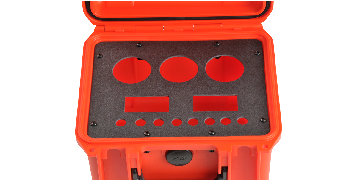 SKB 3i Series Panel Mount Kit in use with a custom foam panel securely mounted inside an orange 3i case.