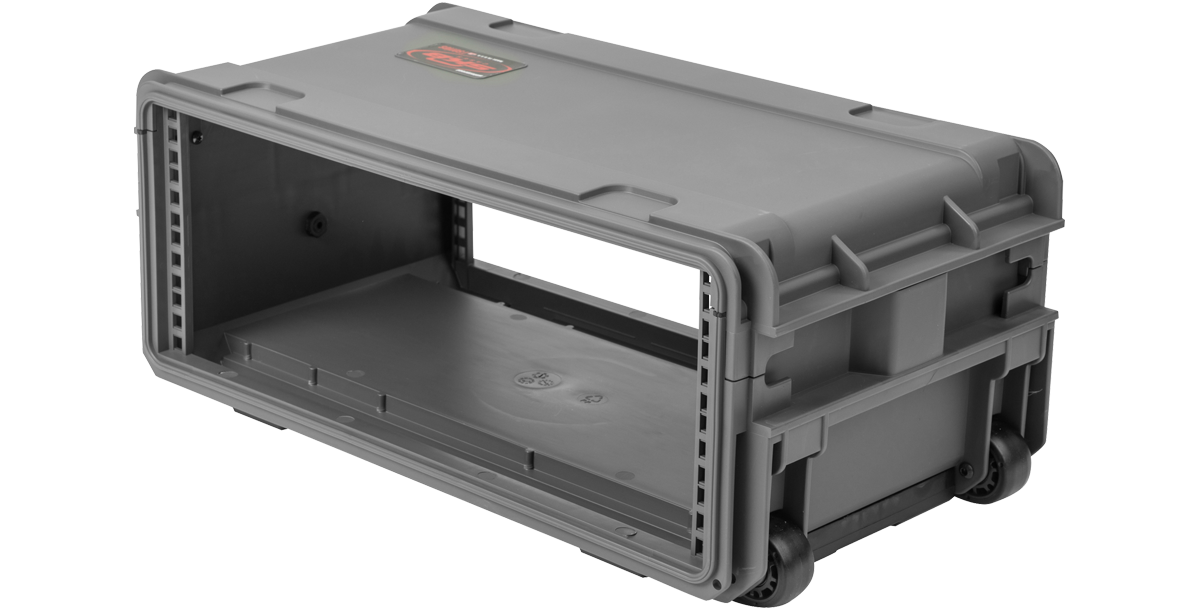 Angled rear view of compact molded rack with built-in wheels and side handles, designed for easy mobility and fast deployment of pro audio gear.