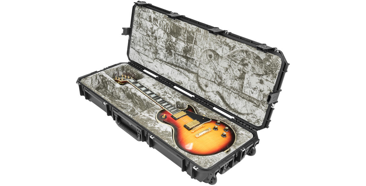 Angled open view of SKB iSeries Guitar Case - Les Paul Waterproof holding a sunburst Les Paul guitar in secure molded foam.