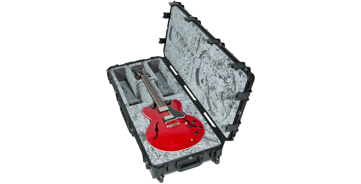 iSeries 335 Waterproof Guitar Case partially open with red electric guitar, highlighting TSA-approved locks and rugged design.