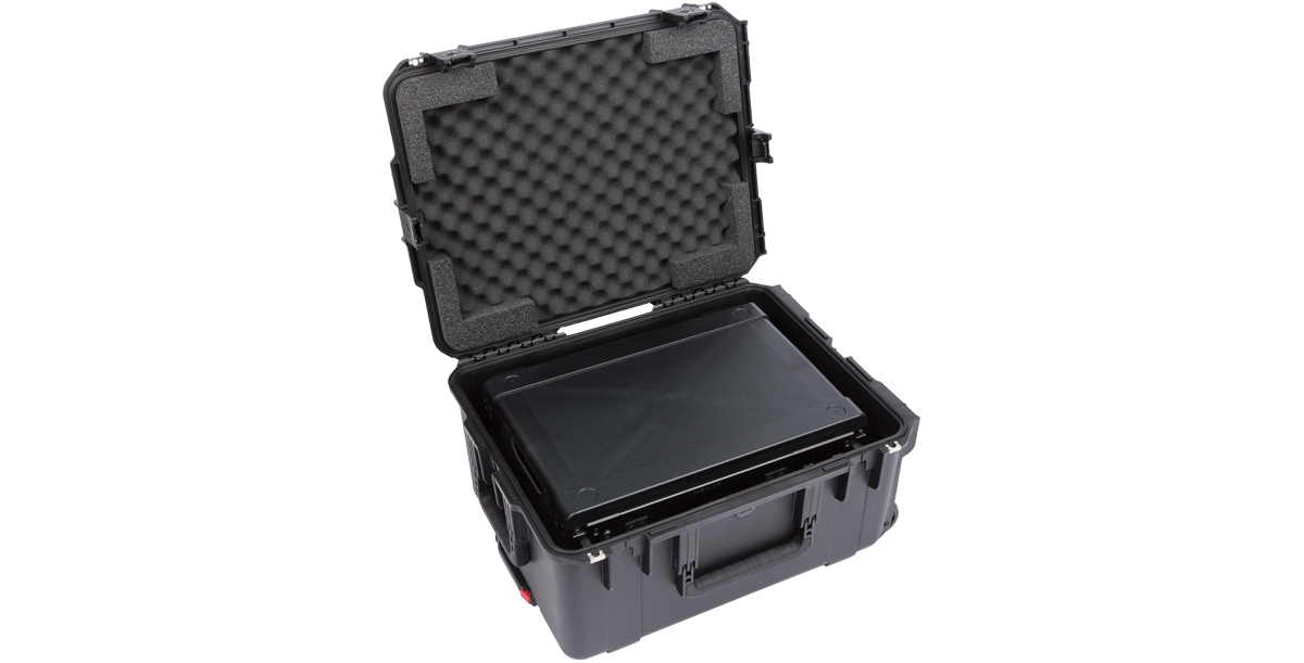 Open iSeries case with Fly Rack securely stored inside, ideal for lightweight and durable transport of pro audio equipment.