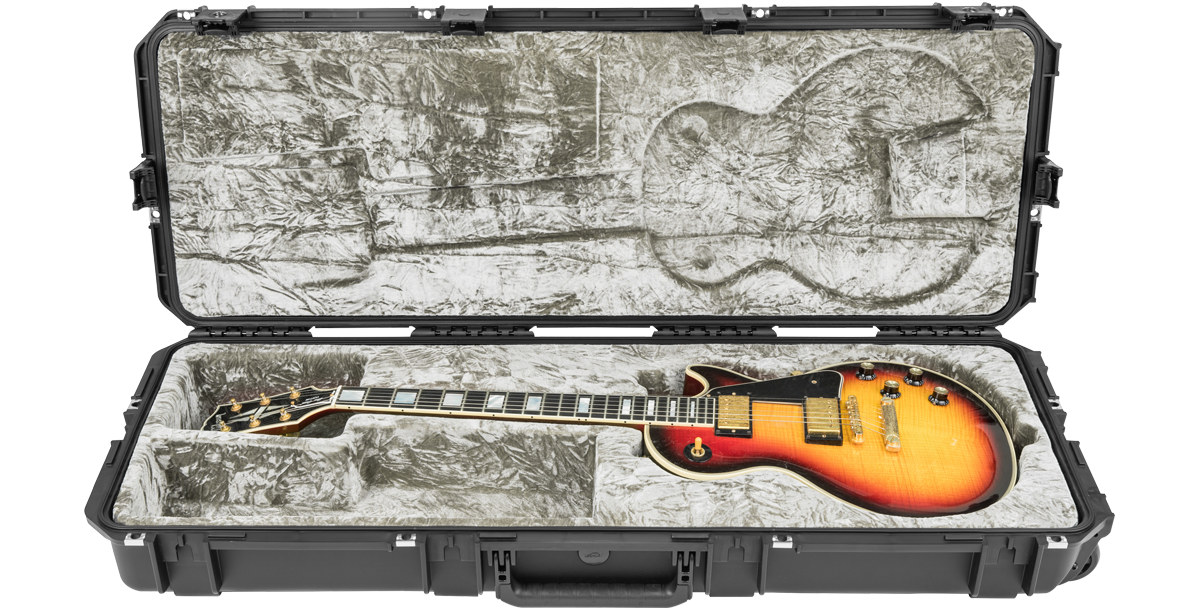 SKB iSeries Guitar Case - Les Paul Waterproof shown with a sunburst electric Les Paul guitar inside plush molded interior.