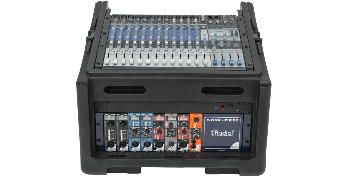 Front view of rolling compact rig with 10U mixer and 4U rack, showcasing mounted audio modules and durable roto-molded housing.