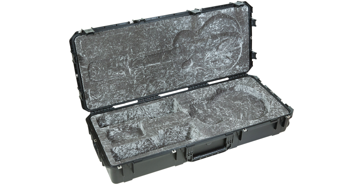 Interior view of iSeries 335 Waterproof Flight Case, featuring molded compartments for 335-style electric guitar and accessories.