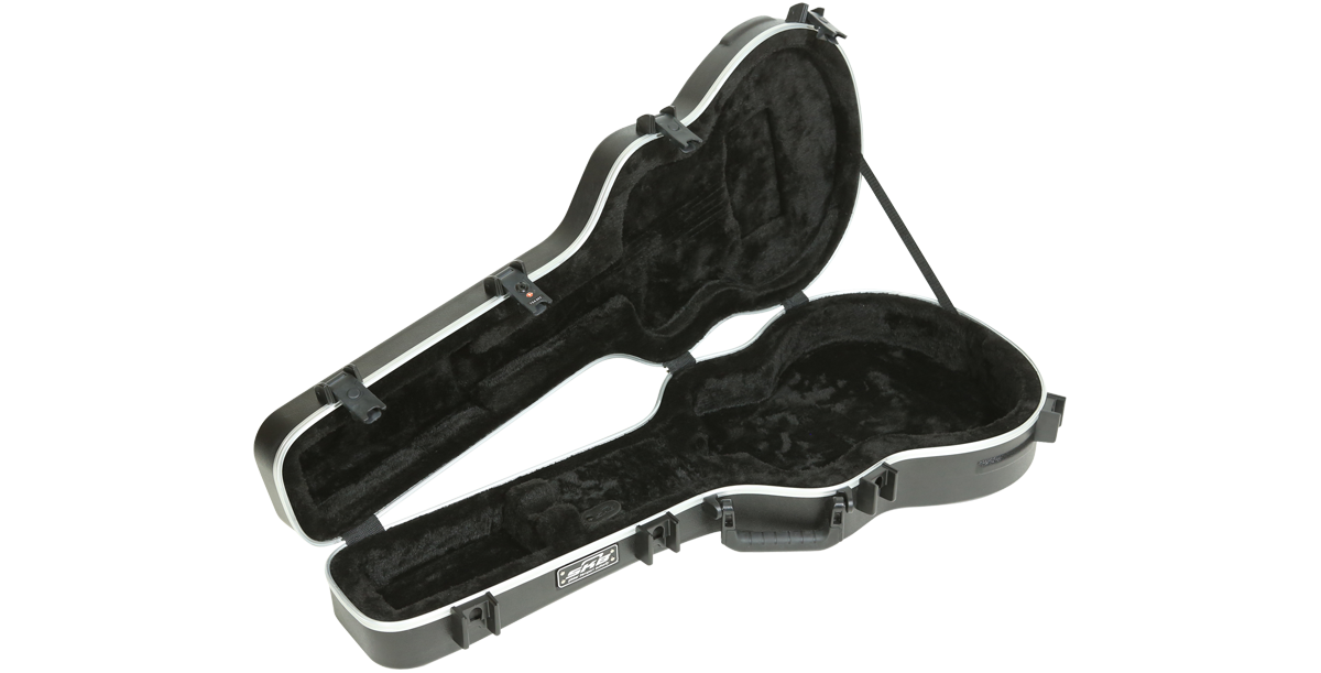 Taylor GS Mini Case open and empty, highlighting contoured interior, neck support, and durable construction for acoustic guitar safety.