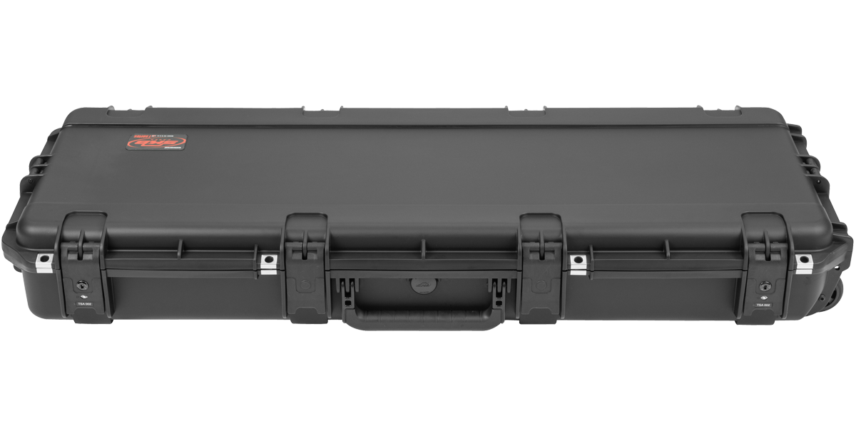 Front view of sealed Strat Tele guitar case with heavy-duty latches and ergonomic handle for secure transport.