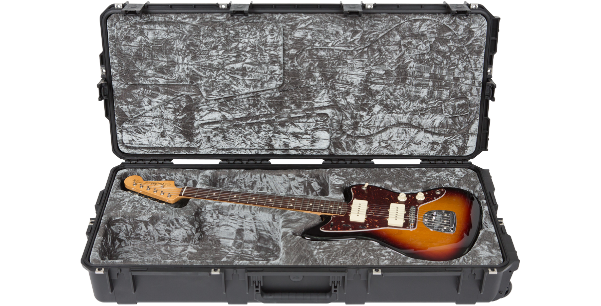 SKB iSeries waterproof guitar case holding a sunburst Jazzmaster guitar, offering military-grade protection and plush interior support.