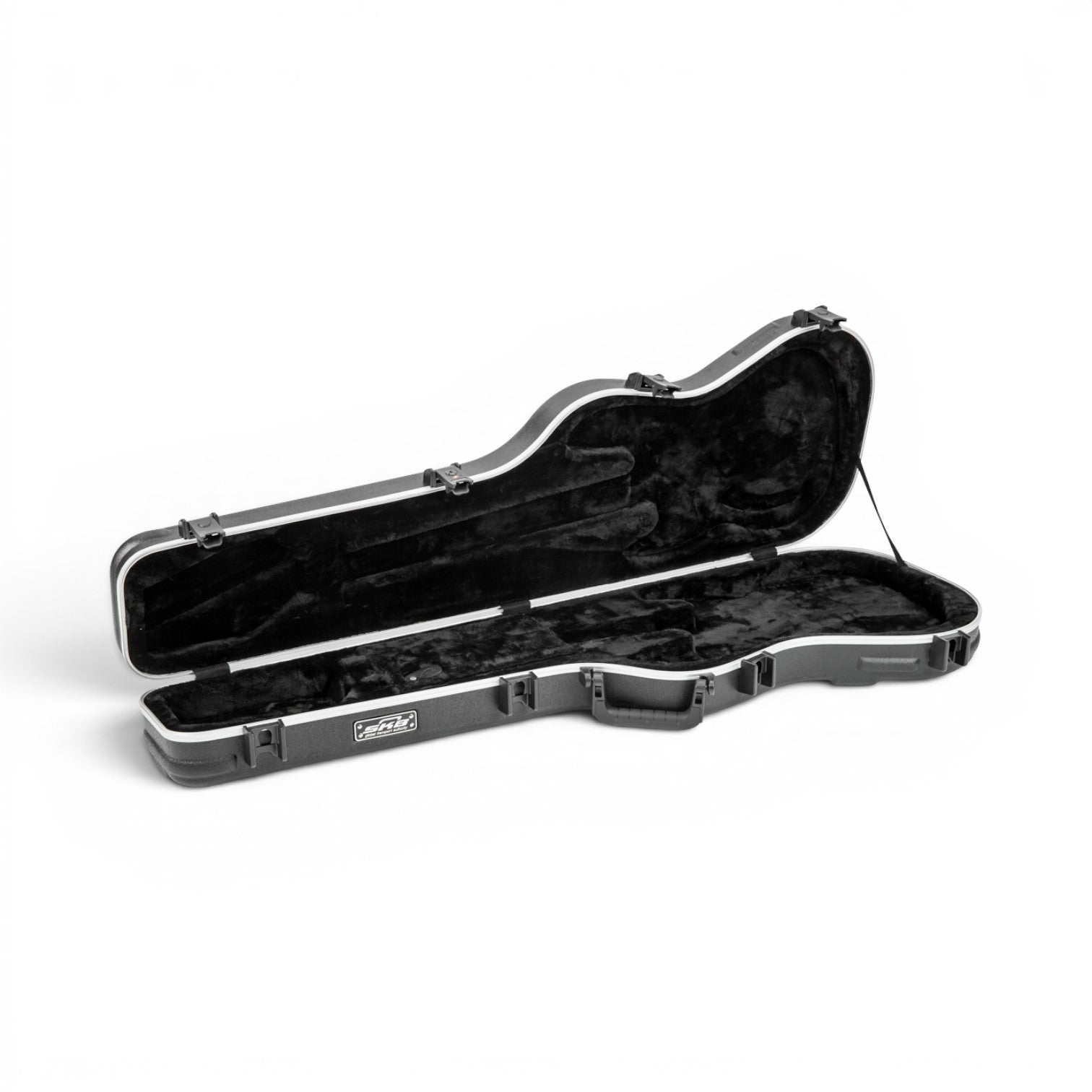 Interior of Precision Jazz Bass Case - TSA Lock Protection empty, showcasing plush black lining and molded compartments for secure bass fit.