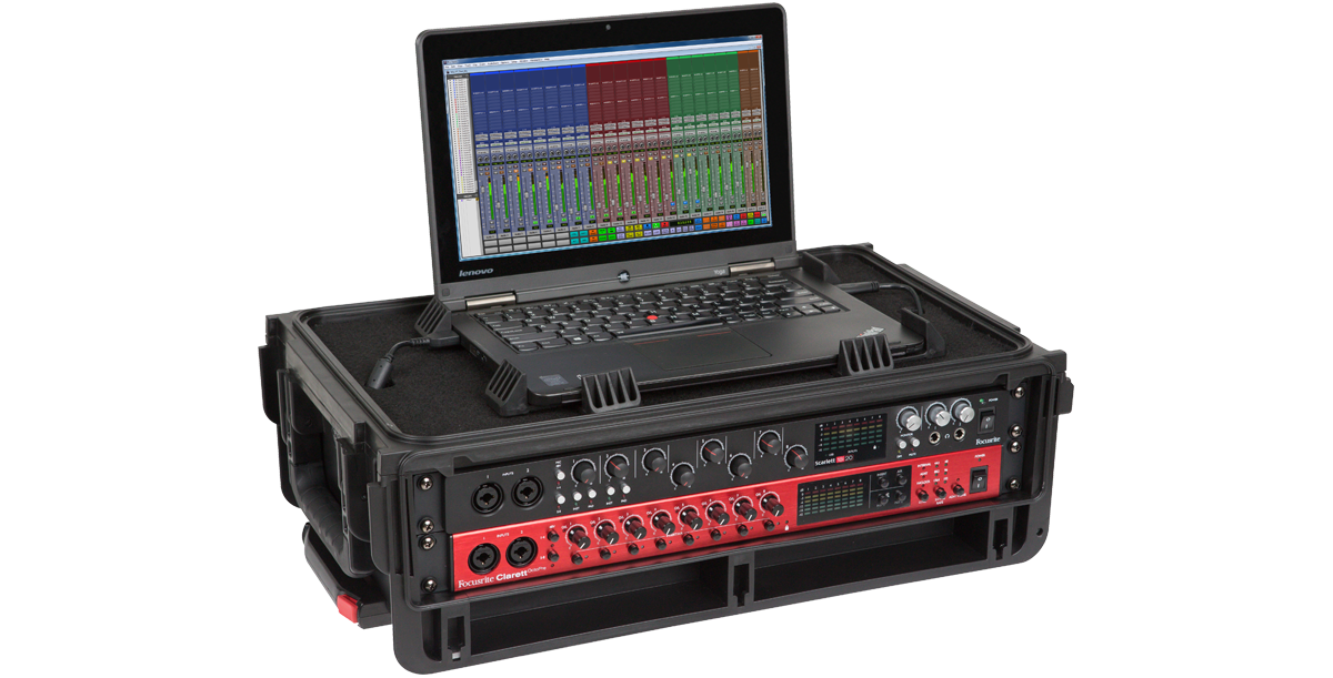 Durable 2U Studio Flyer Rack Case shown with mounted gear and laptop, perfect for travel-ready audio setups and protection.