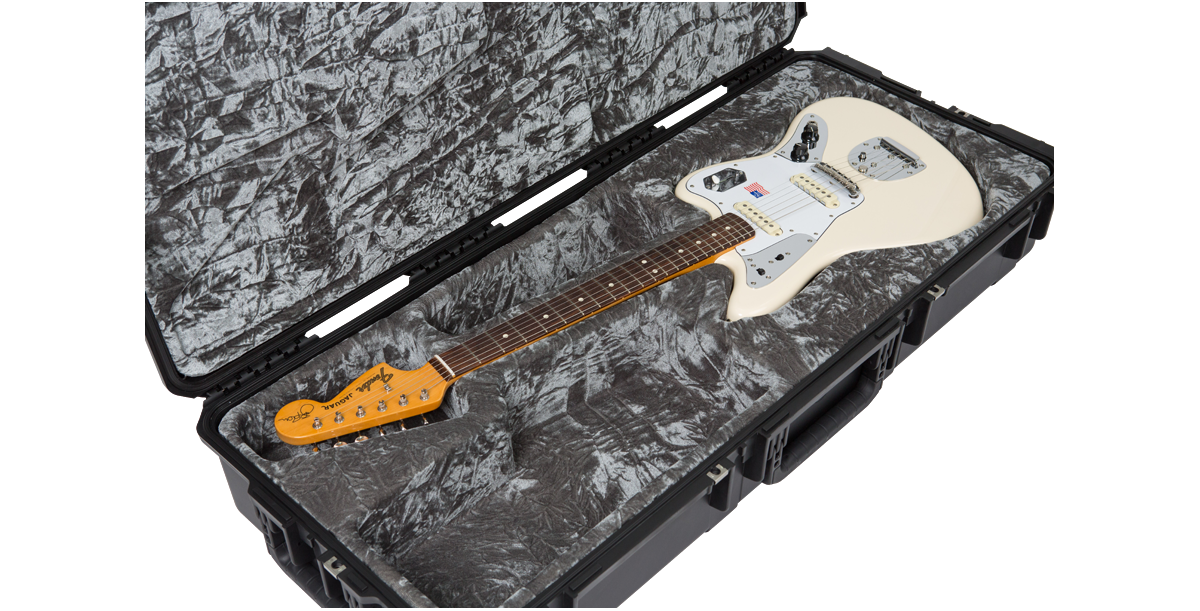 Waterproof Guitar Case for Jaguar Jazzmaster with white electric guitar laid flat in durable, molded interior for maximum protection.