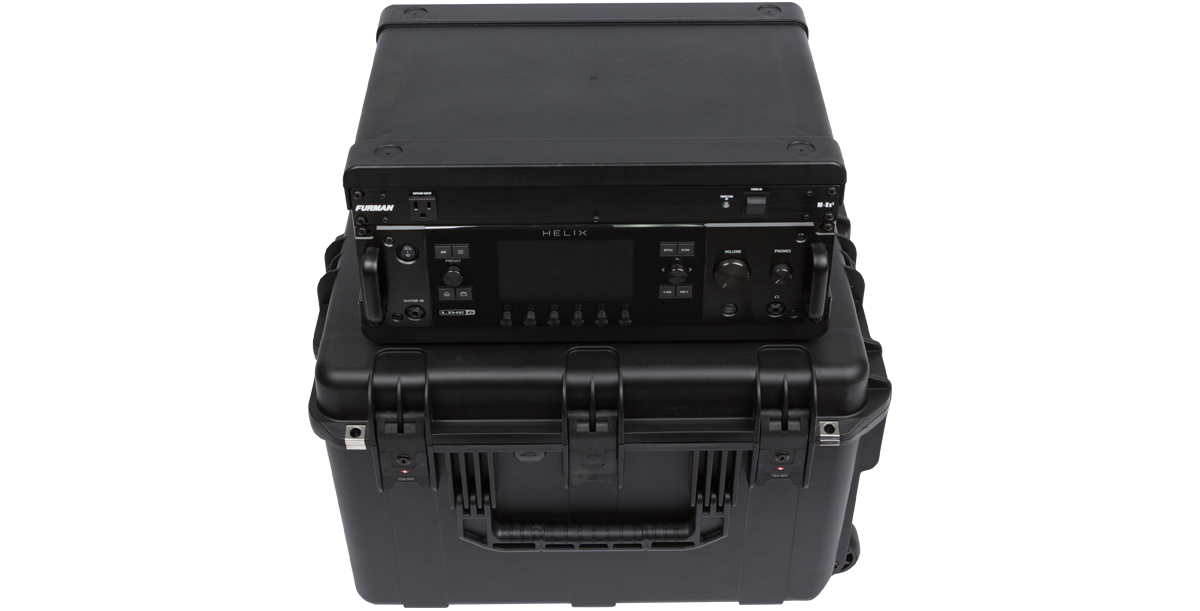 Top-down view of Line 6 Helix mounted in 4U iSeries Guitar FX Fly Rack with secure latches and molded exterior for travel safety.