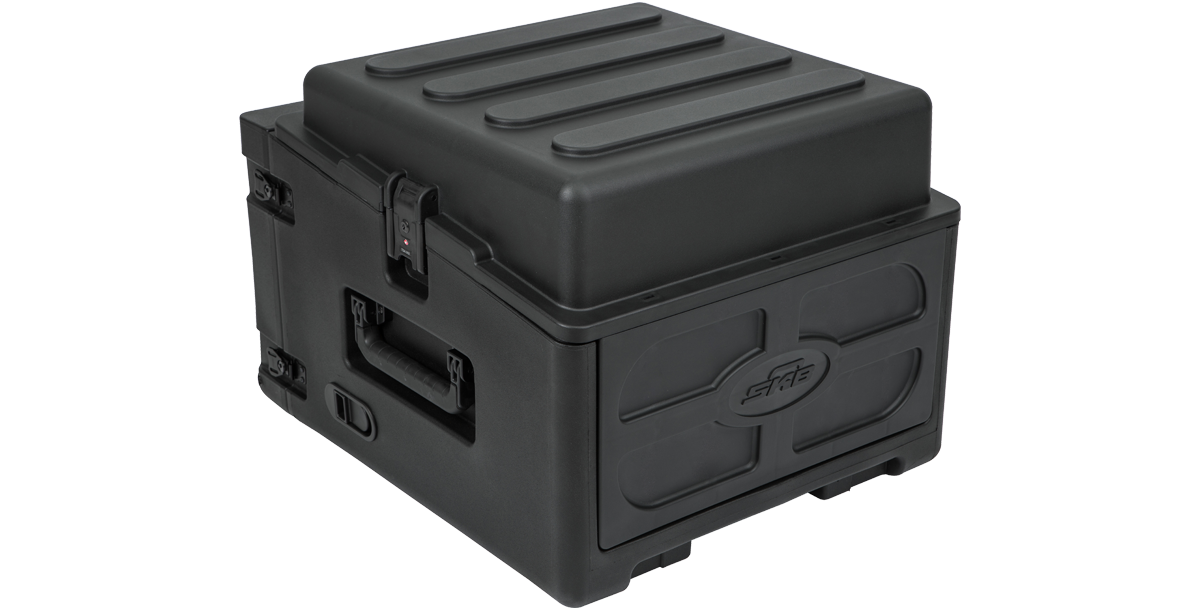 Side view of closed rolling compact rig with molded shell and secure latches. Built for safe transport of 10U and 4U rack gear.