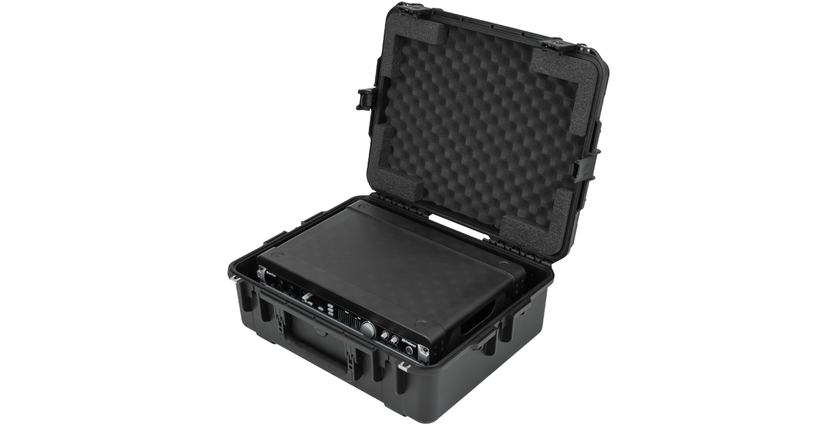 Injection Molded Fly Rack 2U Case partially open with gear inside, showing protective foam and molded-in hinges.