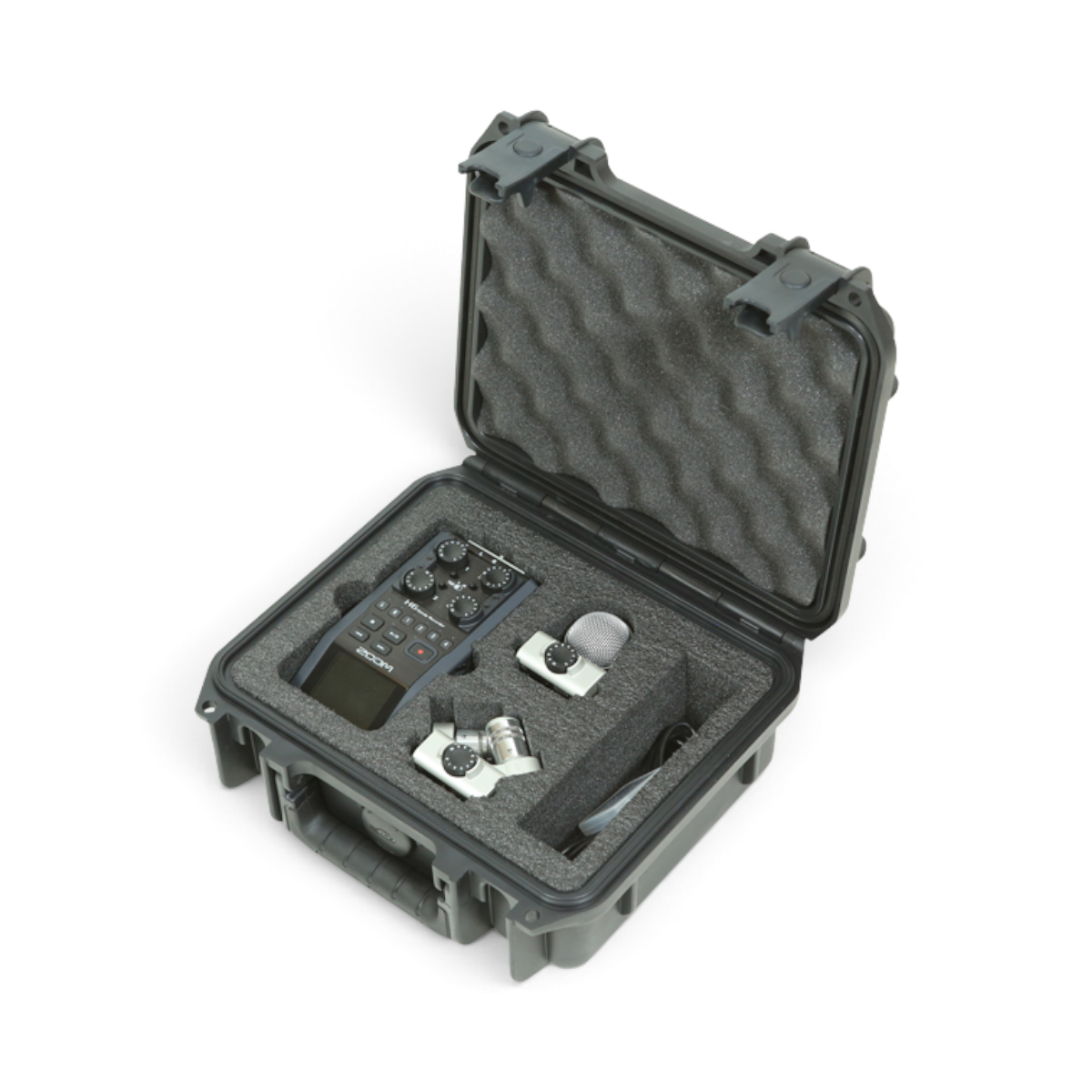 SKB Cases iSeries waterproof hard case with custom foam interior holding a Zoom H6 recorder and microphone capsules.