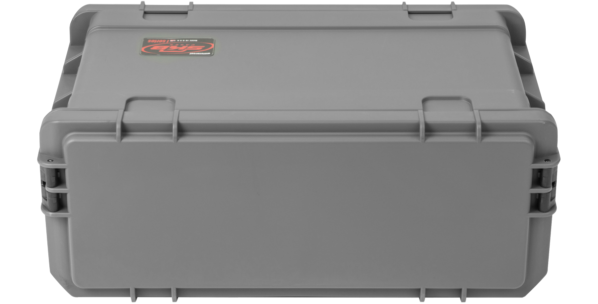 Top-down view of closed compact molded rack with secure latches, showcasing rugged construction for household or professional accessory storage.