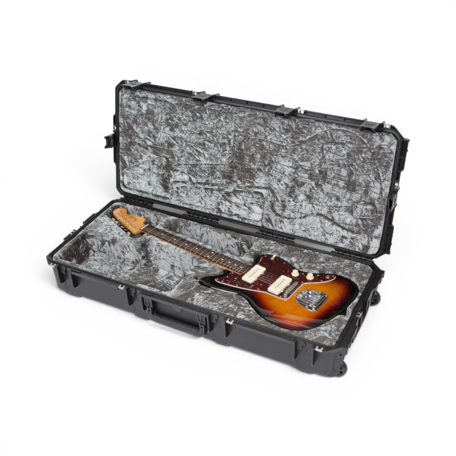 Angled view of sunburst Jazzmaster guitar in waterproof SKB case, highlighting durable shell and precision-fit interior for safe storage.