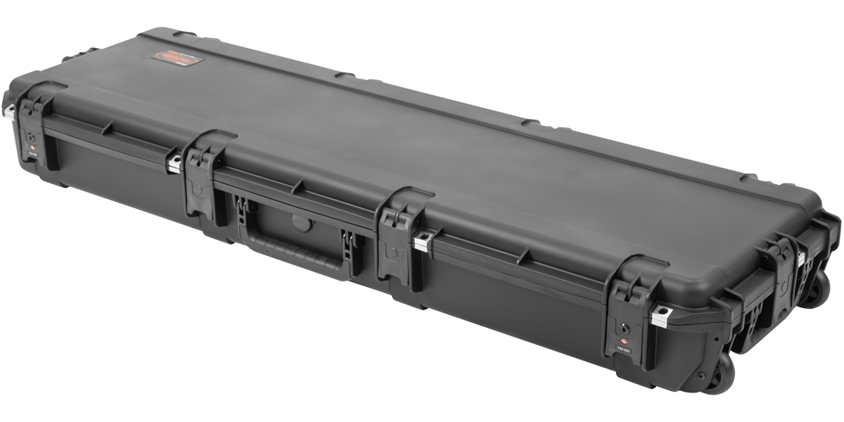 Closed iSeries Waterproof Bass Guitar Case with durable black exterior, TSA-approved locks, and rolling wheels for easy transport.