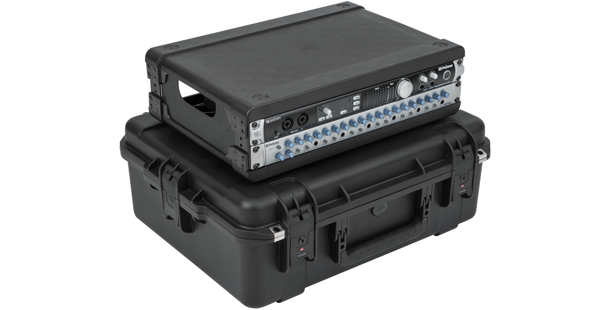 Injection Molded Fly Rack 2U Case with watertight design and TSA locks, shown with mounted audio equipment for durable transport protection.