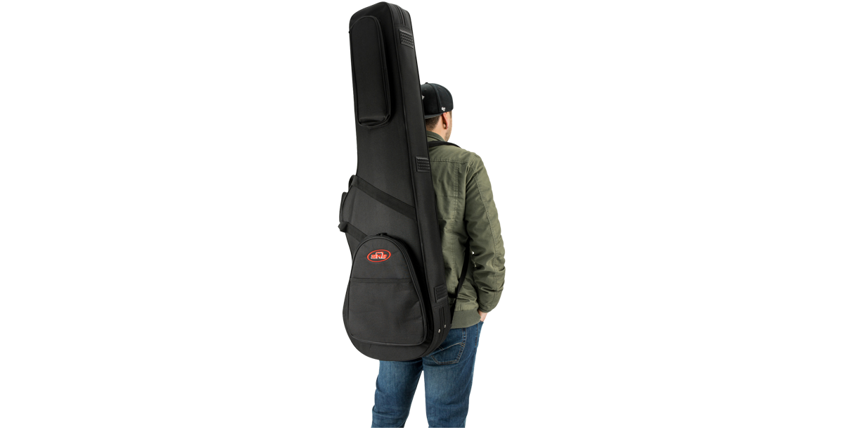 Rear view of person wearing Electric Bass Soft Case, highlighting padded shoulder straps and compact form for easy transport.