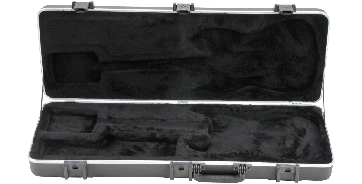 Interior of SKB Pro Guitar Case with molded EPS foam and plush lining, designed to fit Strat and Tele electric guitars securely.