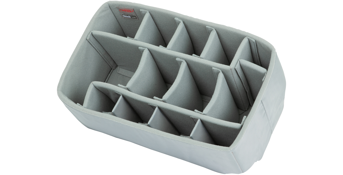 SKB Think Tank iSeries 2011-10 Divider Set accessory kit featuring adjustable padded compartments and durable foam liner for vacuum case inserts.