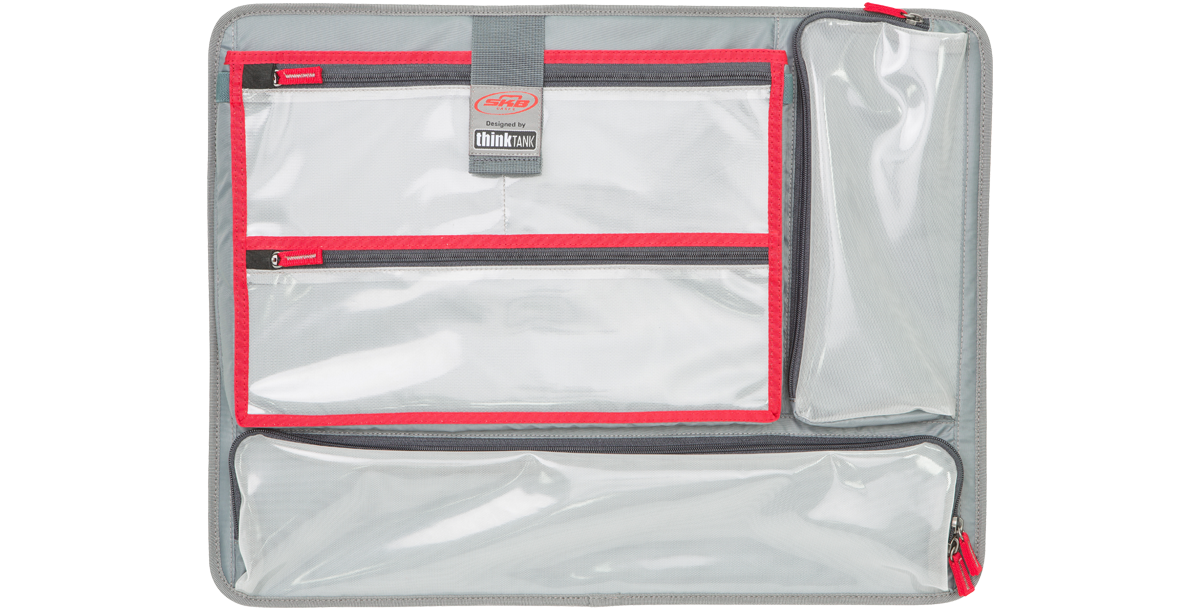 Durable SKB iSeries 2217 Lid Organizer by Think Tank featuring multiple clear compartments and red zipper closures for efficient case organization.