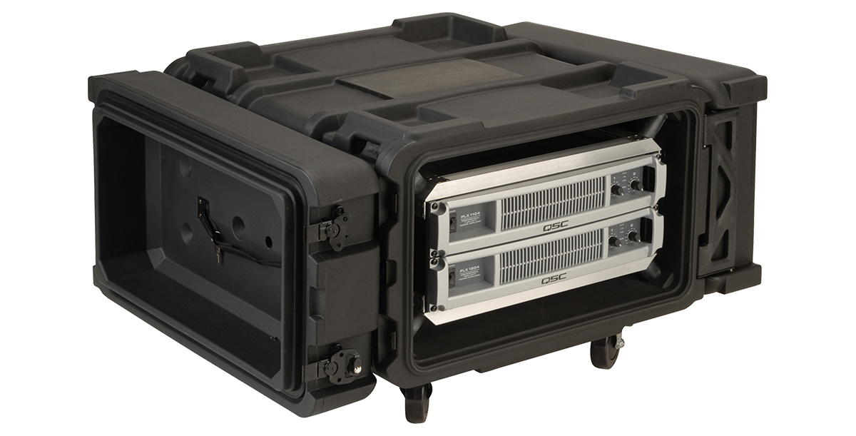 Side view of 24 inch shock rack with QSC amplifiers installed, featuring MIL-SPEC sealing and rugged roto design for heavy-duty use.