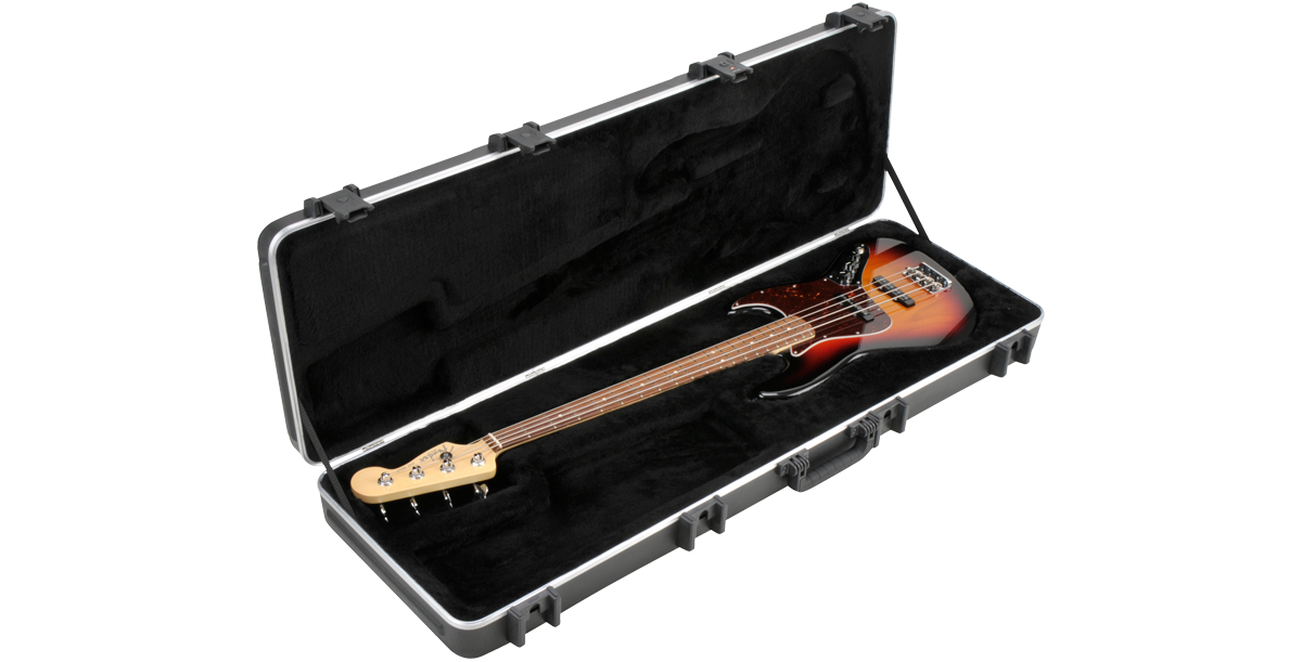 Angled view of SKB Electric Bass Case open with Fender-style bass guitar inside; plush lining and molded fit ensure maximum protection.