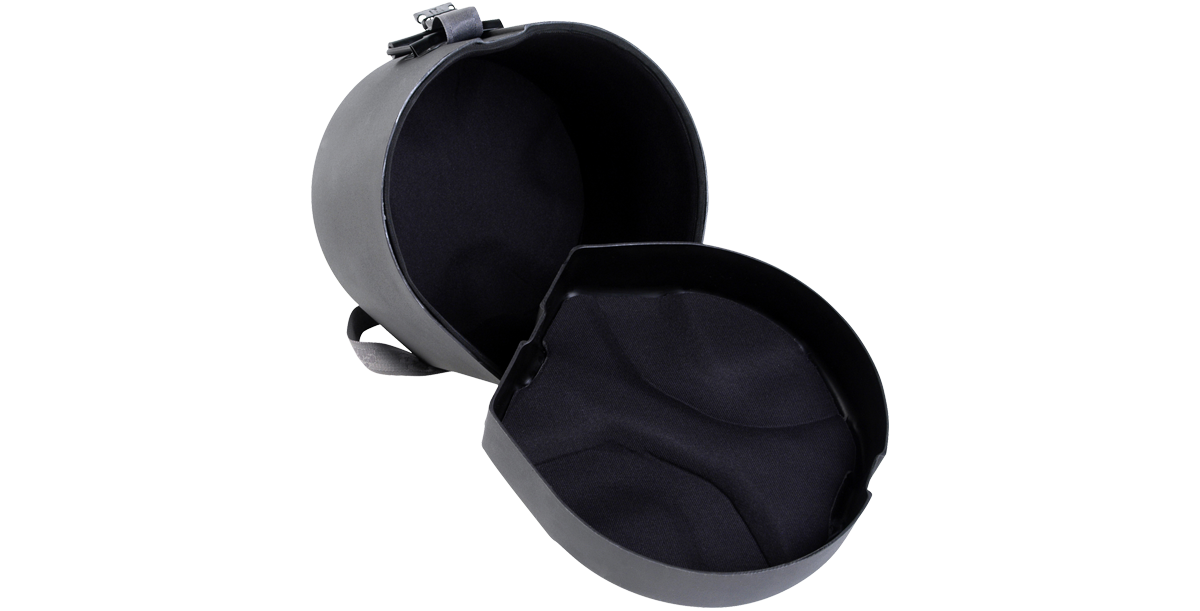 Open roto-molded drum case revealing thick padded interiors and contoured base for secure tom drum placement and shock absorption.